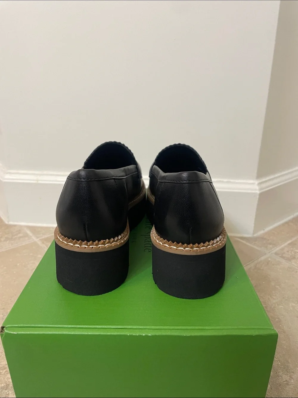 kate spade Black Leather Platform Loafers with Gold Spade Accent